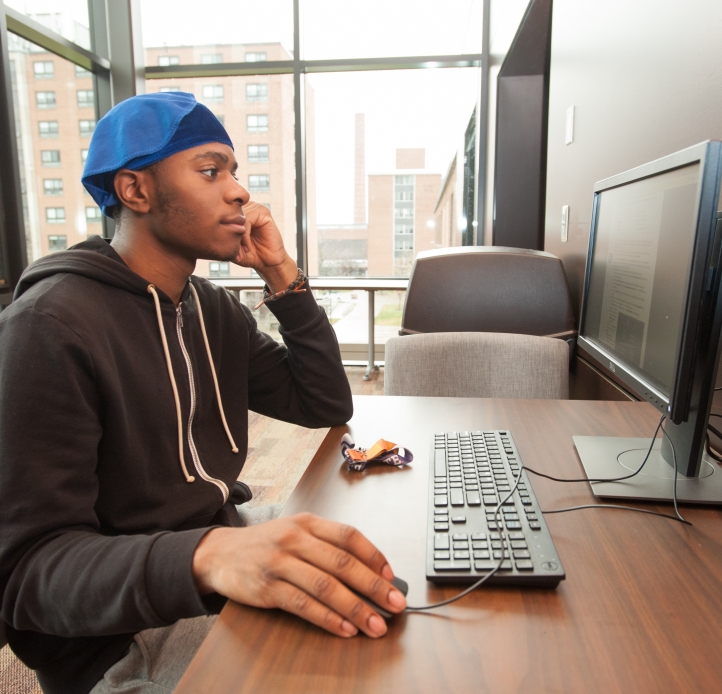 Student studying in Bishop Hall computer lab