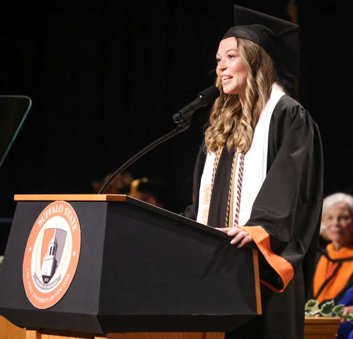 Miranda Shepard delivering student speech at 2026 commencement ceremony