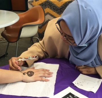 Henna art event in the Honors Hub