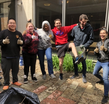 Group photo during courtyard clean up