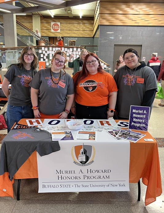 Student ambassadors tabling at open house